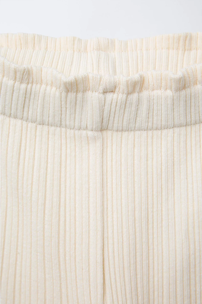 SIDE STRIPE TIE FLARE PANTS