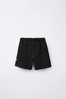 PLUSH TEXT SHORTS