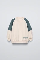 SWEATSHIRT WITH PADDED SHOULDERS