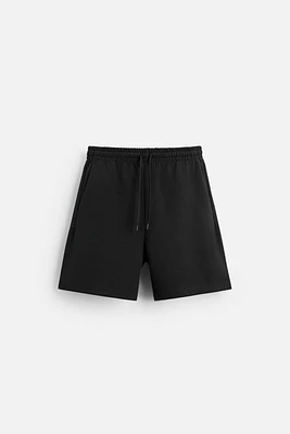 INTERLOCK STRUCTURED SHORTS