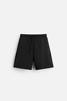 INTERLOCK STRUCTURED SHORTS