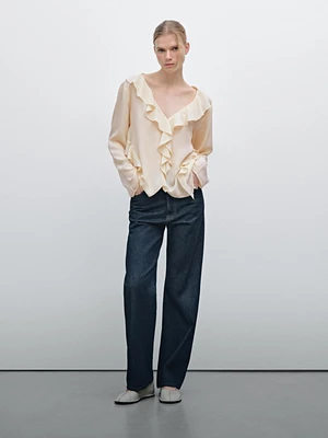 Ruffled shirt with asymmetric hem