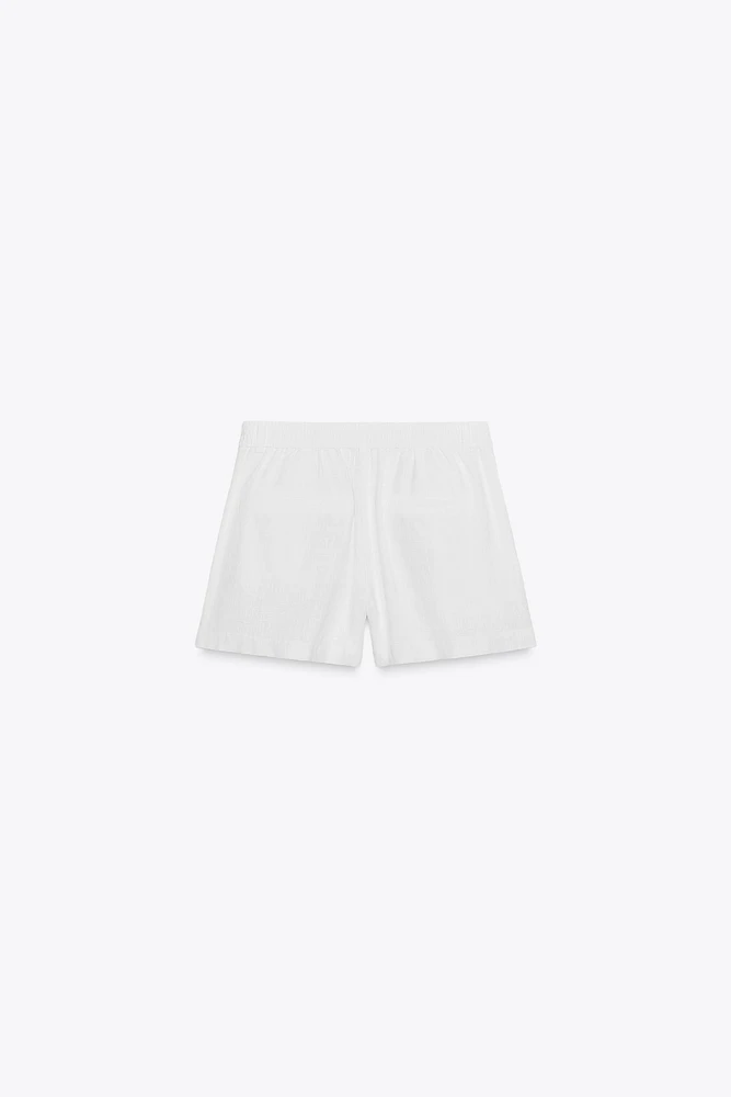 LINEN PLEATED BERMUDA SHORTS