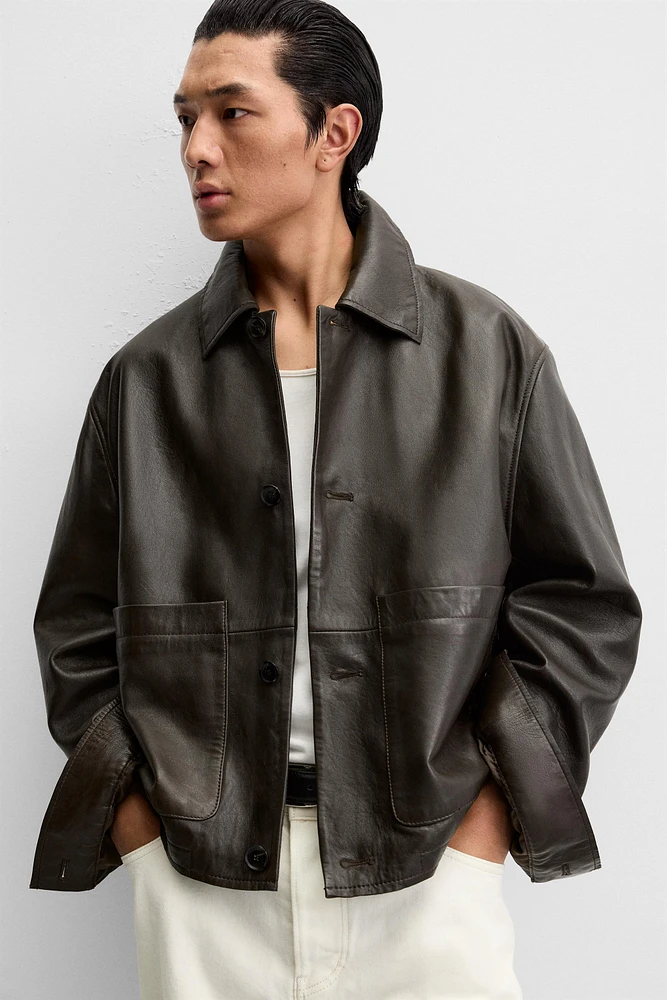 BLOUSON EN CUIR À POCHES