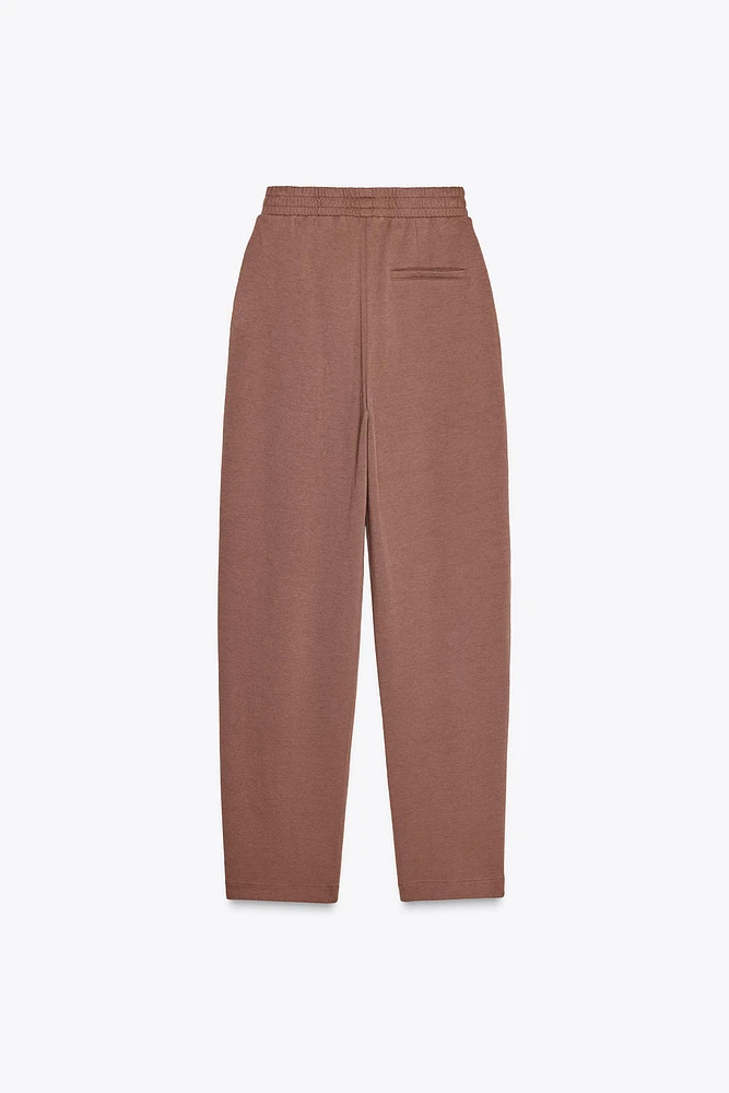 WASHED PLEATED PANTS