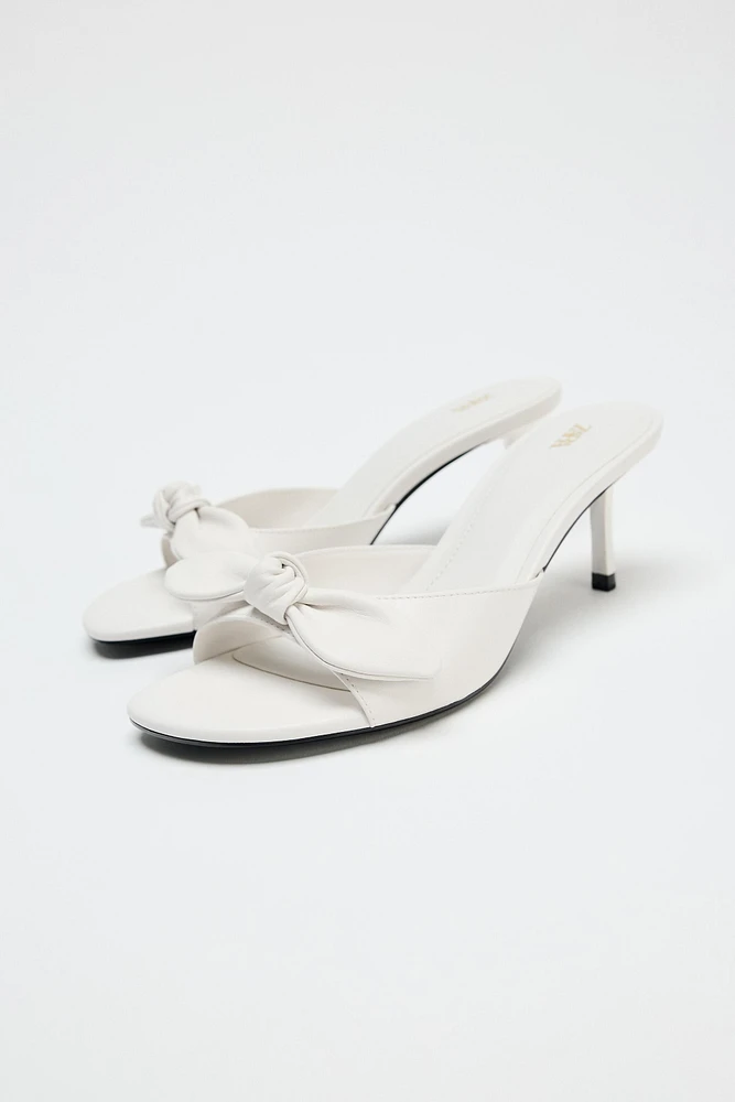 LEATHER BOW HEELED SANDALS