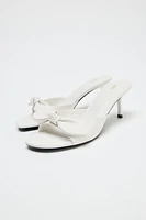 LEATHER BOW HEELED SANDALS