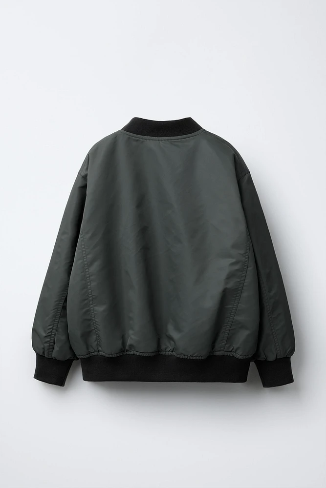 BLOUSON BOMBER EN NYLON À POCHES