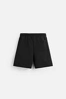 INTERLOCK STRUCTURED SHORTS