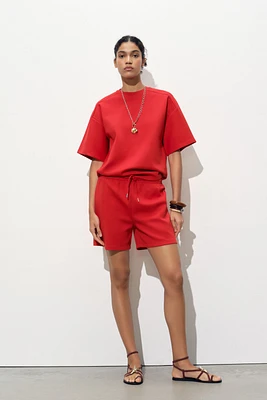 SHORT SLEEVE INTERLOCK SWEATSHIRT