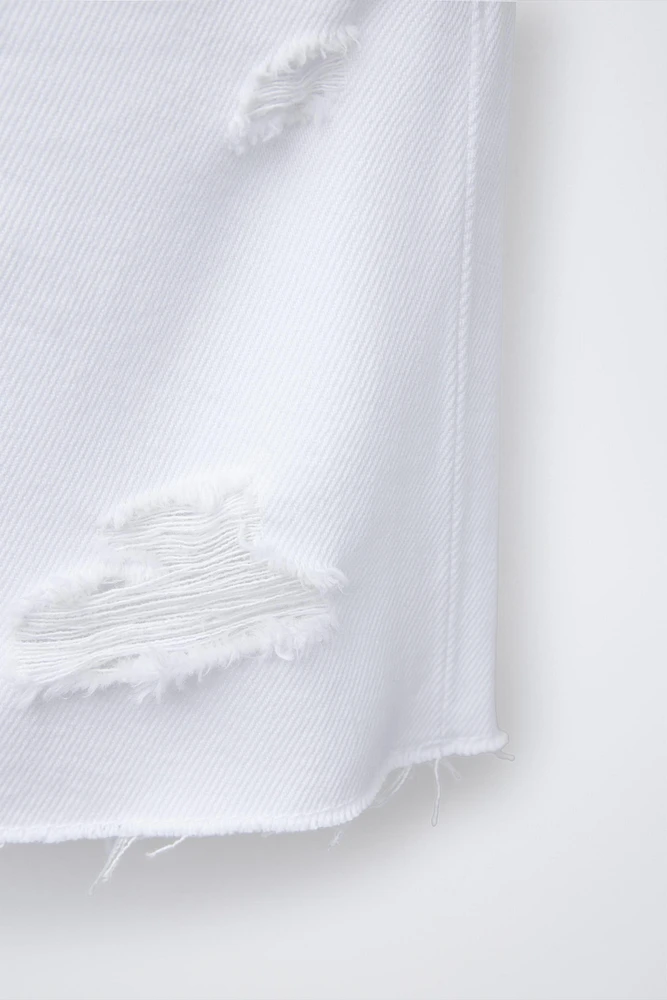 BERMUDA EN DENIM DÉCHIRÉ