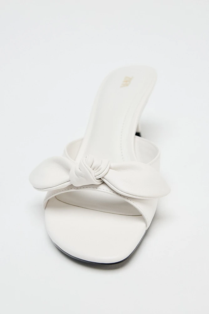 LEATHER BOW HEELED SANDALS