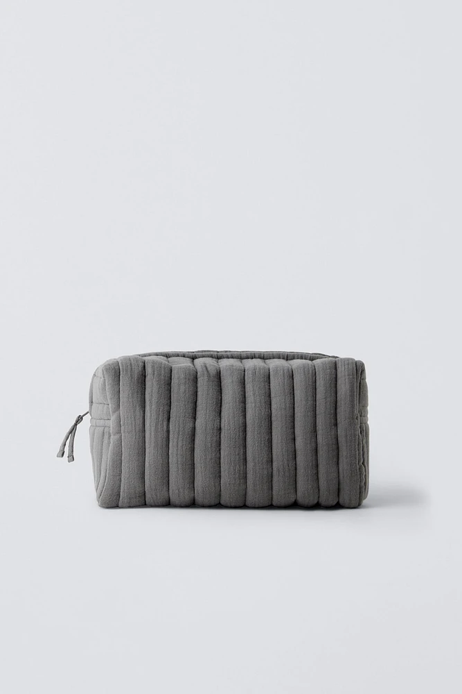 TEXTURED POUCH