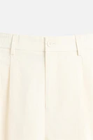 PLEATED CHINO PANTS