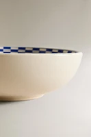 CERAMIC BOWL WITH A CHECKED DESIGN ON THE RIM