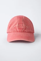 WASHED EFFECT CAP WITH EMBROIDERED TEXT