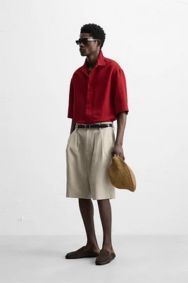 PLEATED WIDE FIT BERMUDA SHORTS