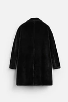 MANTEAU EN FAUSSE FOURRURE