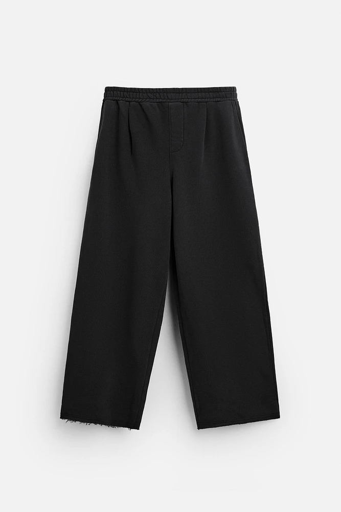 PANTALON DE JOGGING DÉLAVÉ À PLIS