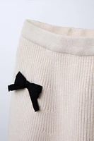 KNIT SKIRT WITH BOWS