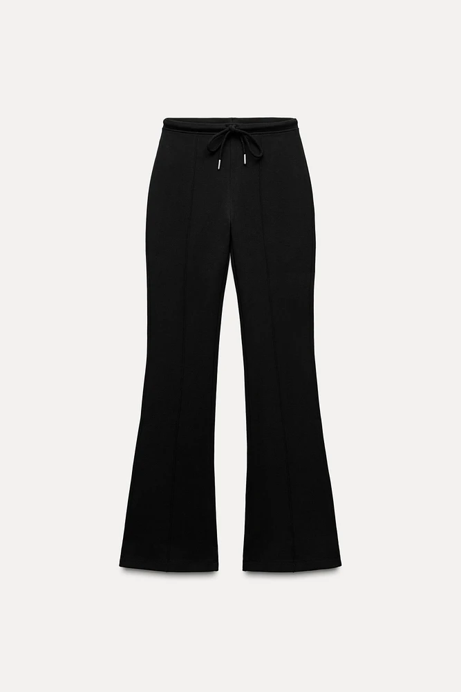 FLARE INTERLOCK PANTS WITH SEAMS