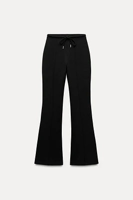 FLARE INTERLOCK PANTS WITH SEAMS