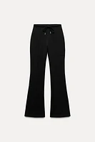 FLARE INTERLOCK PANTS WITH SEAMS