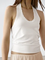 Top slim à encolure américaine effiloché