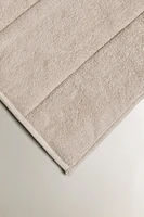 QUILTED TOPPER WITH TOPSTITCHING