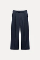 PINSTRIPE PLEATED PANTS