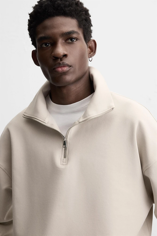 QUARTER ZIP TECHNICAL SWEATSHIRT