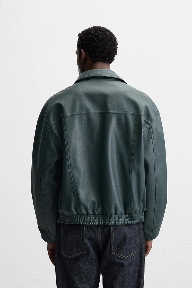 BLOUSON EN MATIÈRE SYNTHÉTIQUE