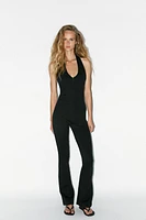 LONG HALTER INTERLOCK JUMPSUIT