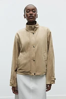 BLOUSON EN MATIÈRE SYNTHÉTIQUE