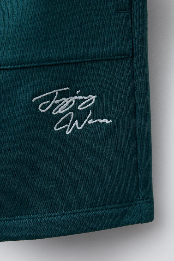 EMBROIDERED JOGGING SHORTS