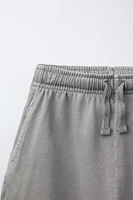 ENSEMBLE TEINT EN PIÈCE T-SHIRT ET BERMUDA IMPRIMÉ