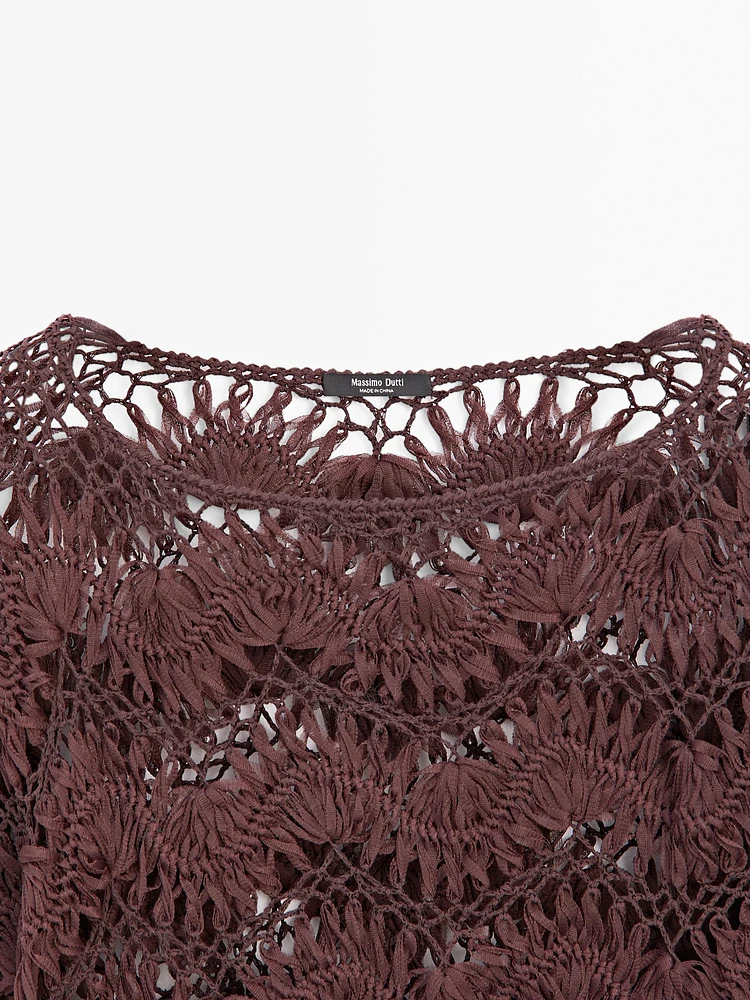 Cape en maille ajourée crochetée