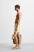 MAILLOT DE BAIN MI-LONG À IMPRIMÉ GÉOMÉTRIQUE