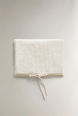 EMBROIDERED TOILETRY BAG