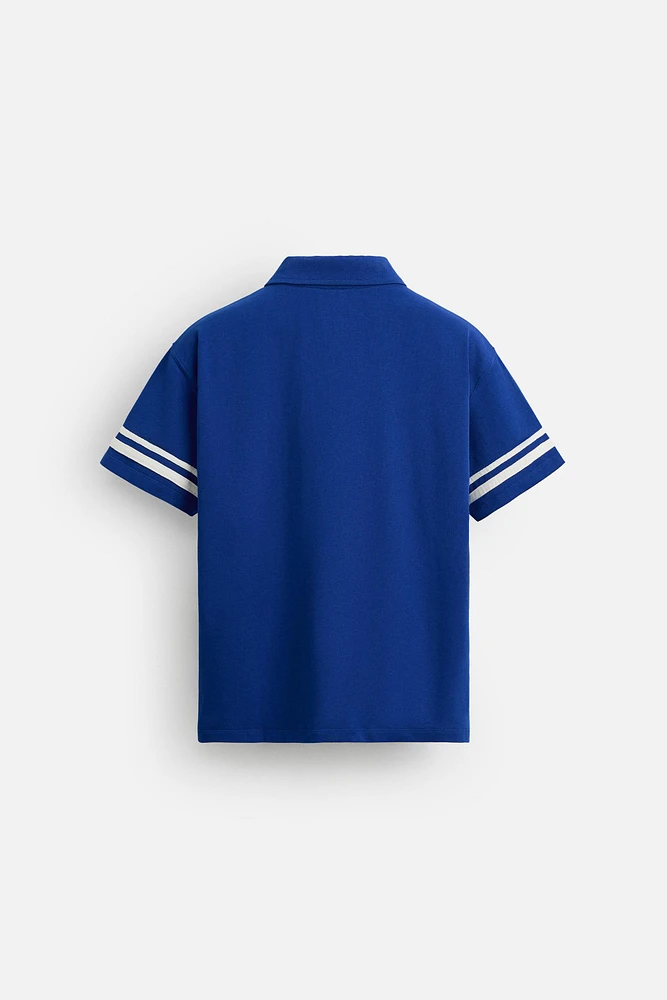 POLO COLOR BLOCK AVEC DRAPEAU