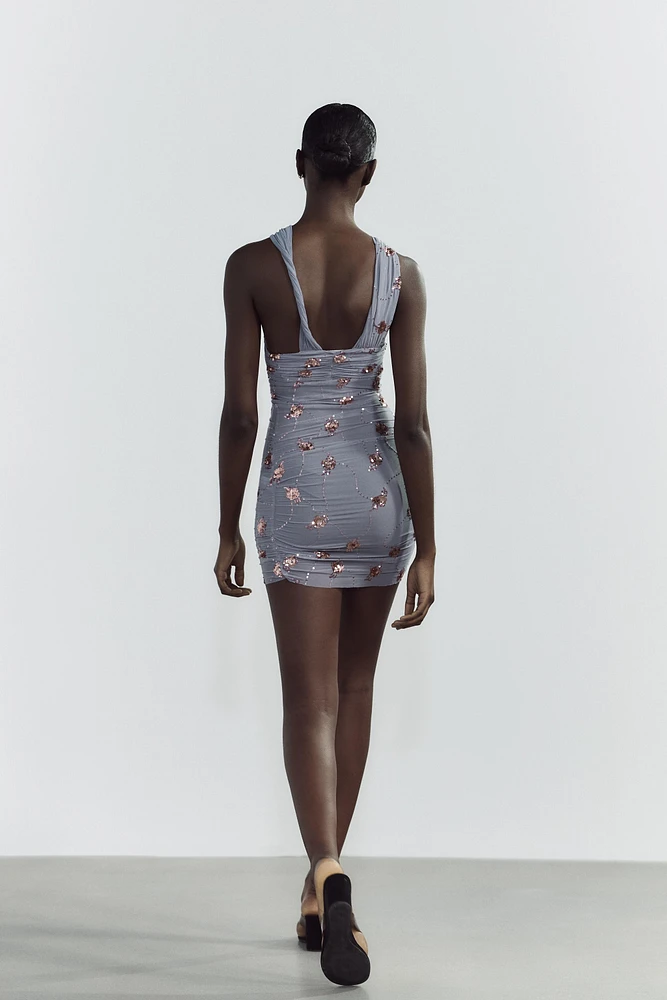 ROBE DRAPÉE À PAILLETTES