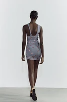 ROBE DRAPÉE À PAILLETTES