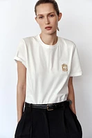 T-SHIRT À FERMOIR