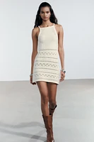 ROBE MINI HALTER EN MAILLE POINTELLE