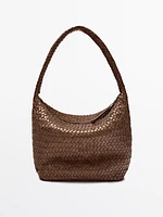 Sac seau tressé en cuir nappa