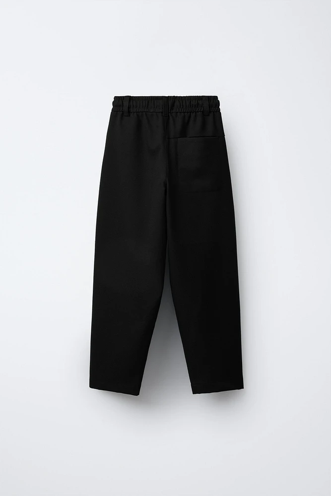 BAGGY PLEATED PANTS