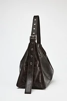 LARGE SOFT BUCKET BAG WITH METAL EYELETS