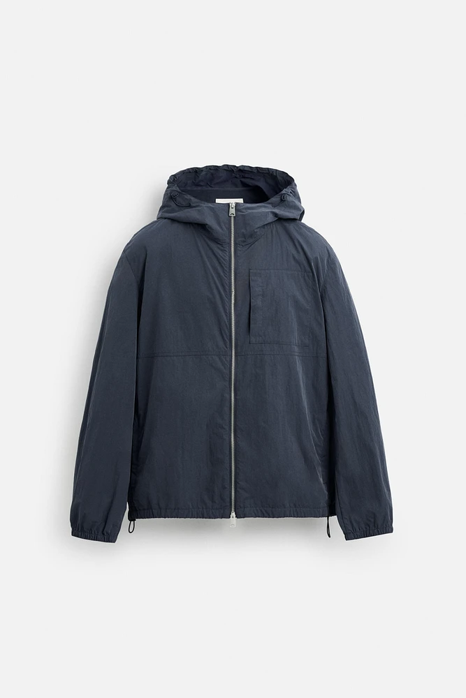 HOODED TECHNICAL JACKET