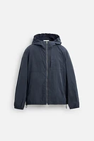 HOODED TECHNICAL JACKET