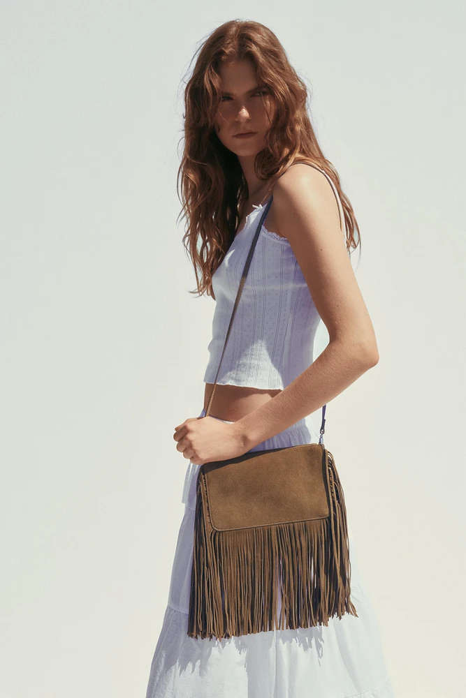 MINI SAC BANDOULIÈRE EN CROÛTE DE CUIR À FRANGES